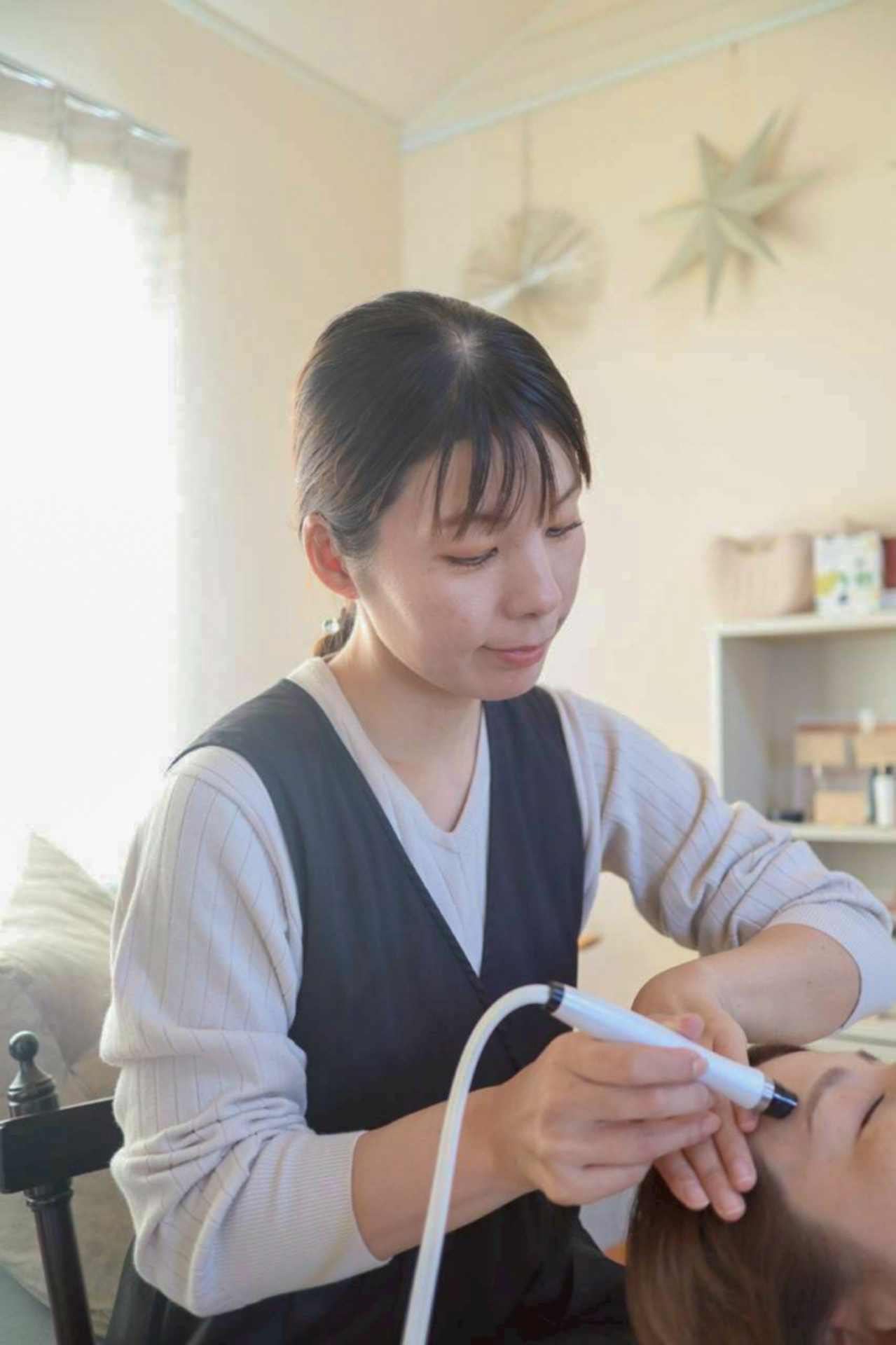 オーナーがマンツーマンで施術している様子
